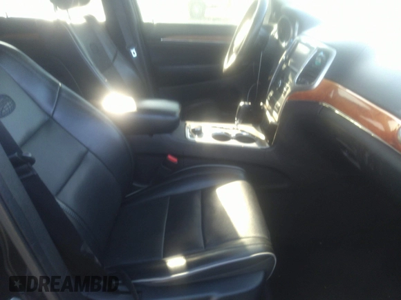 2011 Jeep Grand Cherokee Overland with VIN 1J4RR6GG8BC510143, listed as a IAAI auction lot 41329967 with 195,450 mi miles and . Bid and sale history available at DreamBid. Image 5.