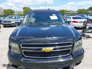 2014 Chevrolet Suburban LS with VIN 1GNSCHE07ER173936, listed as a IAAI auction lot 41967144 with 128,869 mi miles. Bid and sale history available at carsss.com. Image 13.