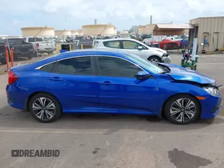 2018 Honda Civic EX-T z VIN JHMFC1F31JX018152, wystawiony jako IAAI lot #41935394 z przebiegiem 60 333 mil mil oraz . Historia ofert i sprzedaży dostępna na DreamBid. Obrazek 13.