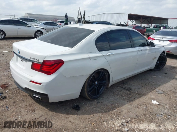 2015 BMW 7 Series 750Li with VIN WBAYE8C54FD780951, listed as a IAAI auction lot 41813038 with 103,131 mi miles. Bid and sale history available at carsss.com. Image 4.