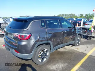 2018 Jeep Compass Trailhawk with VIN 3C4NJDDB3JT231923, listed as a IAAI auction lot 41929198 with 129,001 mi miles and . Bid and sale history available at carsss.com. Image 4.