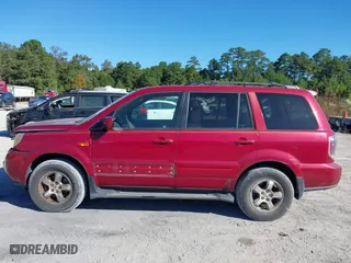 2006 Honda Pilot EX-L with VIN 5FNYF18566B022909, listed as a IAAI auction lot 40576412 with 310,278 mi miles. Bid and sale history available at carsss.com. Image 14.