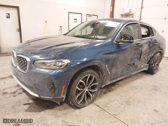 2023 BMW X4 xDrive30i with VIN 5UX33DT01P9R31277, listed as a IAAI auction lot 41618617 with 23,952 mi miles. Bid and sale history available at carsss.com. Image 2.