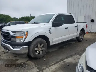 2021 Ford F-150 XL with VIN 1FTEW1C55MFB01166, listed as a Copart auction lot 61606295 with 138,785 mi miles and Clean title. Bid and sale history available at DreamBid. Image 1.