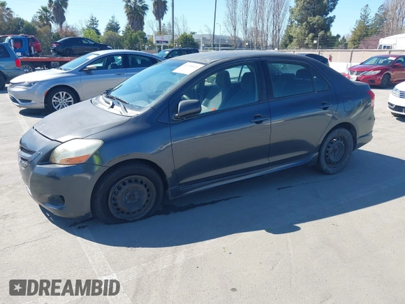 2007 Toyota Yaris with VIN JTDBT923371105048, listed as a IAAI auction lot 41759923 with 166,458 mi miles. Bid and sale history available at carsss.com. Image 2.