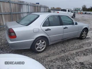 1999 Mercedes-Benz C 230/260/280/320 with VIN WDBHA24G1XA756393, listed as a Copart auction lot 80227694 with 123,520 mi miles and Salvage Title. Bid and sale history available at carsss.com. Image 3.