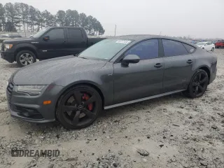 2016 Audi S7 with VIN WAUW2AFC0GN019847, listed as a Copart auction lot 83777124 with 103,009 mi miles and Salvage Title. Bid and sale history available at carsss.com. Image 1.