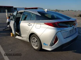 2021 Toyota Prius LE with VIN JTDKAMFP1M3196066, listed as a IAAI auction lot 41752179 with 90,200 mi miles and . Bid and sale history available at DreamBid. Image 3.