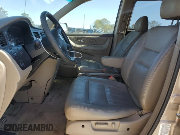 2004 Honda Odyssey EX-L with VIN 5FNRL18974B085790, listed as a Copart auction lot 49159665 with 179,207 mi miles and Salvage Title. Bid and sale history available at DreamBid. Image 7.