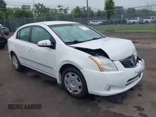 2012 Nissan Sentra S z VIN 3N1AB6APXCL636612, wystawiony jako IAAI lot #42610932 z przebiegiem 150 605 mil mil oraz . Historia ofert i sprzedaży dostępna na DreamBid. Obrazek 1.