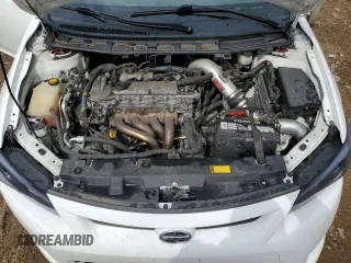 2012 Scion tC z VIN JTKJF5C71C3032427, wystawiony jako Copart lot #54160695 z przebiegiem 59 826 mil mil oraz Szkoda całkowita • Salvage title. Historia ofert i sprzedaży dostępna na DreamBid. Obrazek 11.