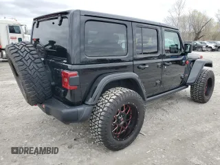 2018 Jeep Wrangler Unlimited Rubicon with VIN 1C4HJXFG4JW266438, listed as a Copart auction lot 50940075 with 75,175 mi miles and Salvage title. Bid and sale history available at DreamBid. Image 3.