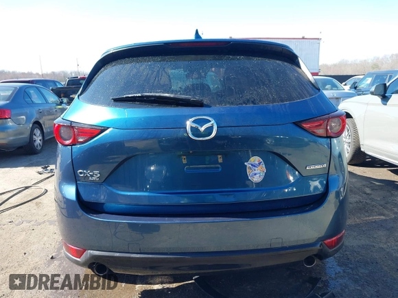 2020 Mazda CX-5 Grand Touring with VIN JM3KFBDM9L0756826, listed as a IAAI auction lot 41866290 with 145,567 mi miles. Bid and sale history available at carsss.com. Image 16.