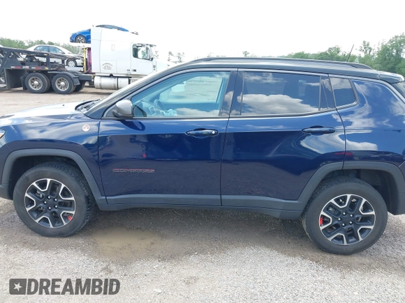 2021 Jeep Compass Trailhawk with VIN 3C4NJDDB0MT590442, listed as a IAAI auction lot 42543530 with 66,669 mi miles and . Bid and sale history available at DreamBid. Image 14.