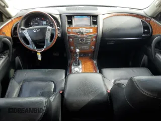 2015 Infiniti QX80 z VIN JN8AZ2ND5F9770320, wystawiony jako Copart lot #55305965 z przebiegiem 168 832 mil mil oraz Czysty tytuł • Clean title. Historia ofert i sprzedaży dostępna na DreamBid. Obrazek 8.