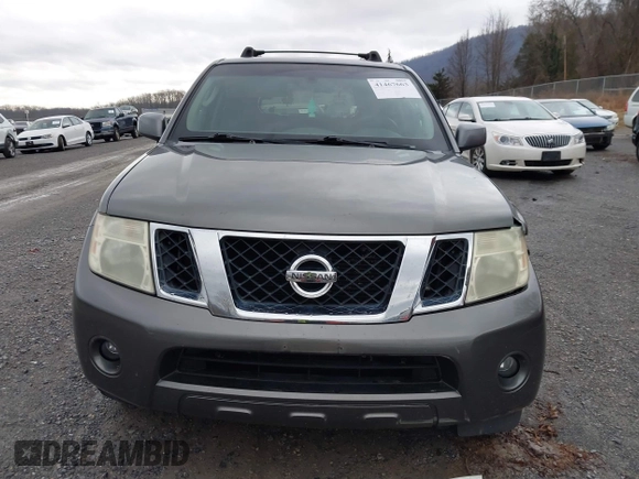 2008 Nissan Pathfinder S z VIN 5N1AR18B48C650137, wystawiony jako IAAI lot #41467663 z przebiegiem 300 846 mil mil oraz . Historia ofert i sprzedaży dostępna na DreamBid. Obrazek 13.