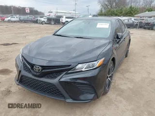 2018 Toyota Camry LE z VIN JTNB11HK6J3005121, wystawiony jako IAAI lot #42065784 z przebiegiem 114 907 mil mil oraz . Historia ofert i sprzedaży dostępna na DreamBid. Obrazek 17.