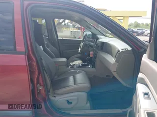 2007 Jeep Grand Cherokee Laredo z VIN 1J8HR48N87C609080, wystawiony jako IAAI lot #42391793 z przebiegiem 159 096 mil mil oraz . Historia ofert i sprzedaży dostępna na DreamBid. Obrazek 5.