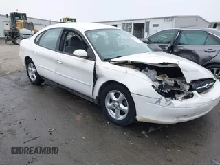 2003 Ford Taurus SES Standard with VIN 1FAFP55213G227020, listed as a IAAI auction lot 41232398 with 98,890 mi miles and . Bid and sale history available at DreamBid. Image 1.