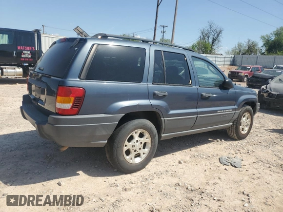 2003 Jeep Grand Cherokee Laredo with VIN 1J4GX48S83C504543, listed as a Copart auction lot 52723835 with 220,574 mi miles and Clean Title. Bid and sale history available at carsss.com. Image 3.