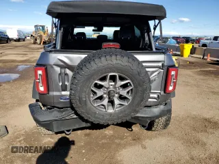 2023 Ford Bronco with VIN 1FMEE5DP0PLC10002, listed as a Copart auction lot 57272555 with 14,035 mi miles and Salvage title. Bid and sale history available at DreamBid. Image 6.