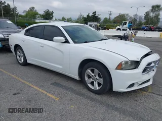 2014 Dodge Charger SE with VIN 2C3CDXBG3EH131242, listed as a IAAI auction lot 42121260 with 231,452 mi miles and . Bid and sale history available at DreamBid. Image 1.