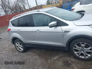 2016 Ford Escape Titanium with VIN 1FMCU9J93GUC55811, listed as a IAAI auction lot 41961519 with 99,878 mi miles. Bid and sale history available at carsss.com. Image 13.