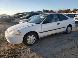 1998 Honda Civic DX with VIN 1HGEJ6225WL040734, listed as a Copart auction lot 83671054 with 143,563 mi miles and Salvage Title. Bid and sale history available at carsss.com. Image 1.