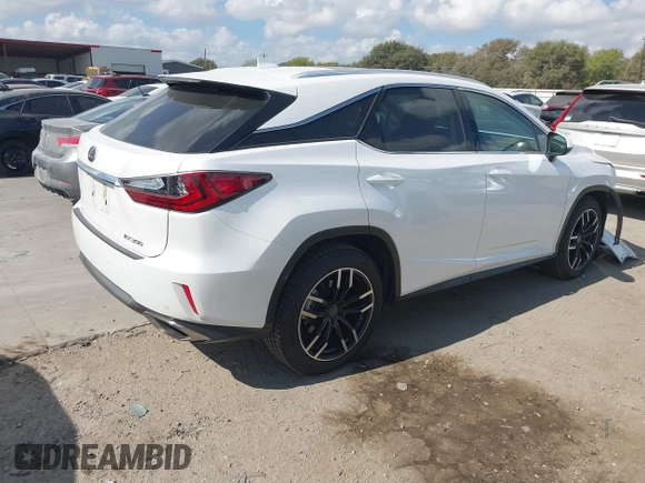 2016 Lexus RX 350 with VIN 2T2BZMCA2GC039839, listed as a IAAI auction lot 40676490 with 72,708 mi miles and . Bid and sale history available at DreamBid. Image 4.
