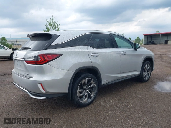 2018 Lexus RX 450hL Premium with VIN JTJDGKCA6J2003954, listed as a IAAI auction lot 42259774 with 93,706 mi miles and . Bid and sale history available at DreamBid. Image 4.