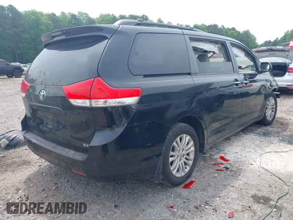 2011 Toyota Sienna XLE AAS with VIN 5TDYK3DC3BS103531, listed as a IAAI auction lot 42290142 with 231,995 mi miles and . Bid and sale history available at DreamBid. Image 4.