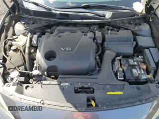 2016 Nissan Maxima SL with VIN 1N4AA6APXGC903559, listed as a Copart auction lot 61213525 with 124,575 mi miles and Salvage title. Bid and sale history available at DreamBid. Image 11.