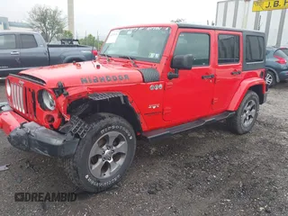 2017 Jeep Wrangler Unlimited Sahara with VIN 1C4HJWEG6HL609208, listed as a IAAI auction lot 42231634 with 87,466 mi miles and . Bid and sale history available at DreamBid. Image 18.