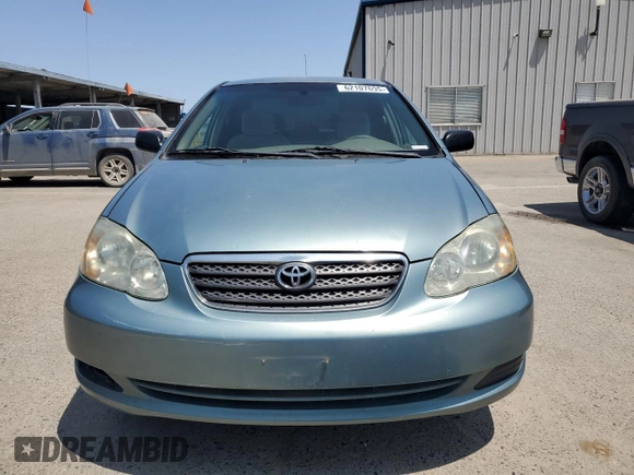 2006 Toyota Corolla CE with VIN 1NXBR32E56Z579489, listed as a Copart auction lot 62107695 with 198,269 mi miles and Salvage title. Bid and sale history available at DreamBid. Image 5.