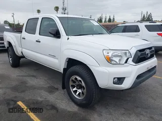 2012 Toyota Tacoma PreRunner with VIN 3TMKU4HN2CM033717, listed as a IAAI auction lot 42090139 with 142,613 mi miles and . Bid and sale history available at DreamBid. Image 1.