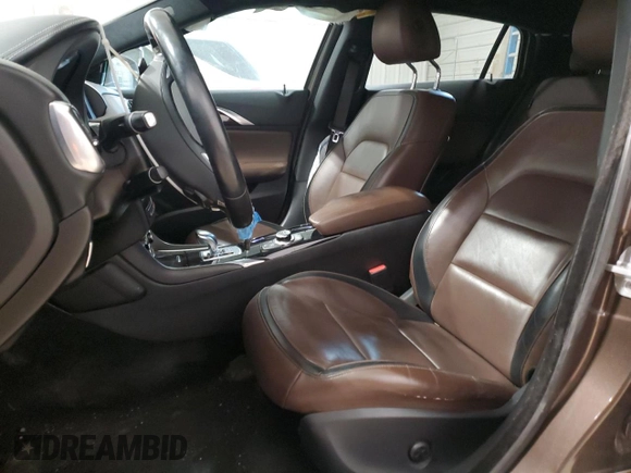 2017 Infiniti QX30 Premium with VIN SJKCH5CR9HA017539, listed as a Copart auction lot 84092934 with 89,019 mi miles and Salvage title. Bid and sale history available at DreamBid. Image 7.