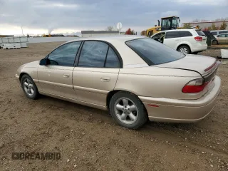 1998 Cadillac Catera z VIN W06VR52R5WR028774, wystawiony jako Copart lot #78085484 z przebiegiem 104 609 mil mil oraz Szkody całkowita. Historia ofert i sprzedaży dostępna na DreamBid. Obrazek 2.