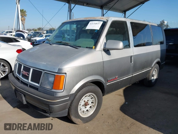 1991 GMC Safari z VIN 1GKDM19Z2MB530997, wystawiony jako IAAI lot #42134837 z przebiegiem 195 085 mil mil oraz . Historia ofert i sprzedaży dostępna na DreamBid. Obrazek 2.