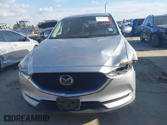 2020 Mazda CX-5 Touring with VIN JM3KFACMXL1786200, listed as a IAAI auction lot 41506139 with 121,944 mi miles. Bid and sale history available at carsss.com. Image 13.