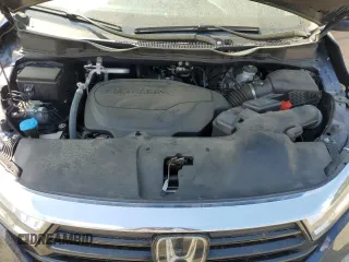 2023 Honda Odyssey Touring с VIN 5FNRL6H84PB035017, выставлен на аукционе Copart как лот 51666035 с пробегом 47 818 миль миль и Списание • Salvage title. История ставок и продаж доступна на DreamBid. Изображение 12.