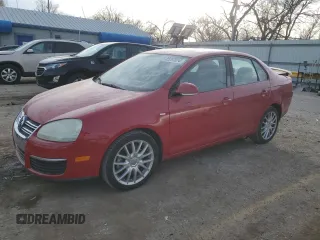 2009 Volkswagen Jetta Wolfsburg Edition with VIN 3VWRJ71K39M021963, listed as a Copart auction lot 85297034 with 90,910 mi miles and Salvage title. Bid and sale history available at DreamBid. Image 1.