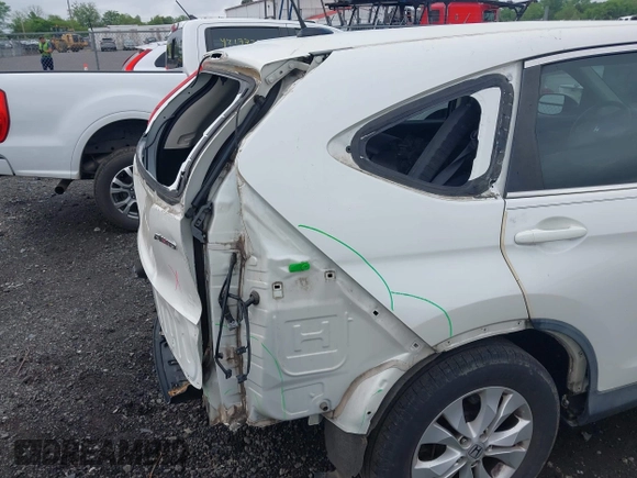 2014 Honda CR-V EX-L with VIN 5J6RM4H74EL014066, listed as a IAAI auction lot 42176490 with 206,016 mi miles and . Bid and sale history available at DreamBid. Image 18.