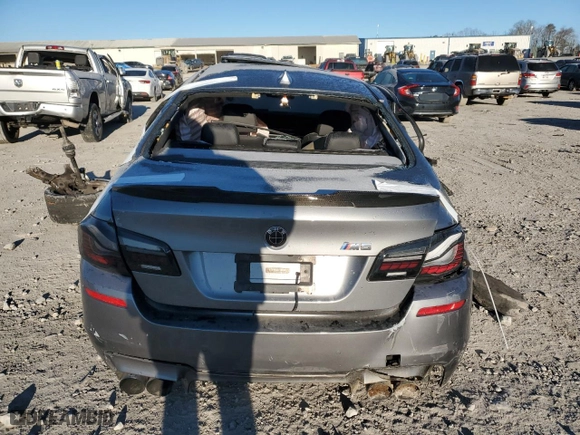 2014 BMW M5 with VIN WBSFV9C57ED593159, listed as a Copart auction lot 87475634 with 0 mi miles and Salvage Title. Bid and sale history available at carsss.com. Image 6.