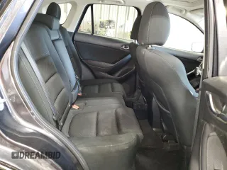 2016 Mazda CX-5 Touring with VIN JM3KE4CY3G0716346, listed as a Copart auction lot 51467895 with 133,218 mi miles and Salvage Title. Bid and sale history available at carsss.com. Image 11.