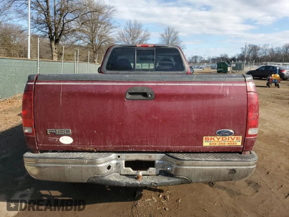 1999 Ford F-150 with VIN 1FTRF17W7XNA44872, listed as a Copart auction lot 41815695 with 182,678 mi miles and Salvage title. Bid and sale history available at DreamBid. Image 6.