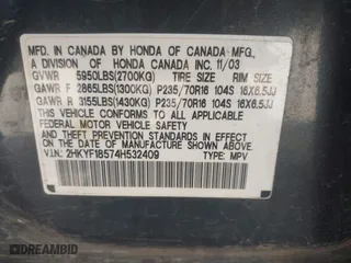2004 Honda Pilot EX with VIN 2HKYF18574H532409, listed as a IAAI auction lot 41701760 with 302,949 mi miles. Bid and sale history available at carsss.com. Image 9.