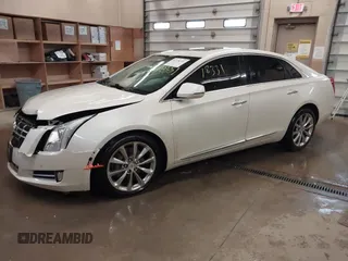 2013 Cadillac XTS Luxury with VIN 2G61R5S37D9152726, listed as a IAAI auction lot 41718331 with 88,189 mi miles and . Bid and sale history available at DreamBid. Image 2.