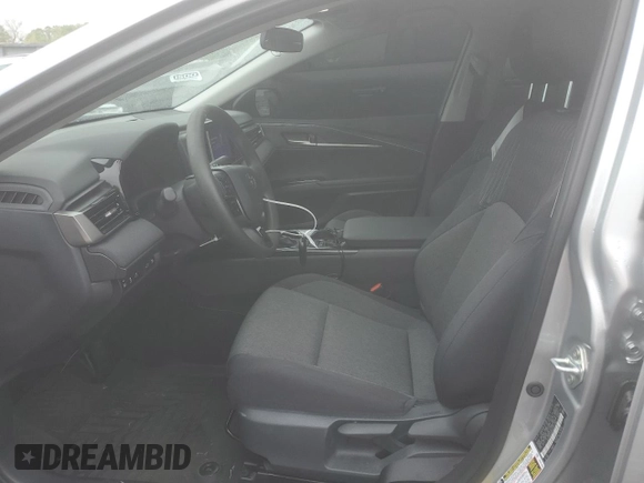 2025 Toyota Camry LE with VIN 4T1DAACKXSU043785, listed as a Copart auction lot 52207785 with 9,410 mi miles and Salvage Title. Bid and sale history available at DreamBid. Image 7.