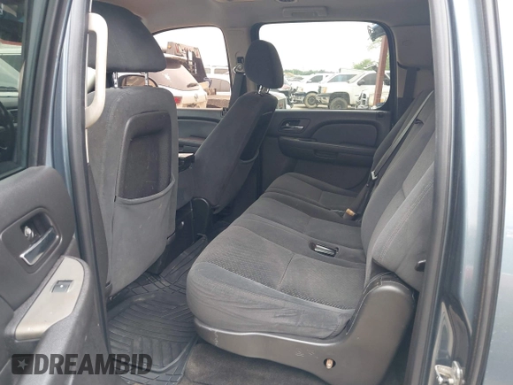 2008 Chevrolet Suburban LS with VIN 1GNFC16008J199742, listed as a IAAI auction lot 42175563 with 288,973 mi miles and . Bid and sale history available at DreamBid. Image 8.