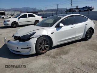 2021 Tesla Model 3 Standard Range Plus with VIN 5YJ3E1EA8MF874156, listed as a Copart auction lot 46323505 with Not Provided miles and Salvage Title. Bid and sale history available at DreamBid. Image 1.